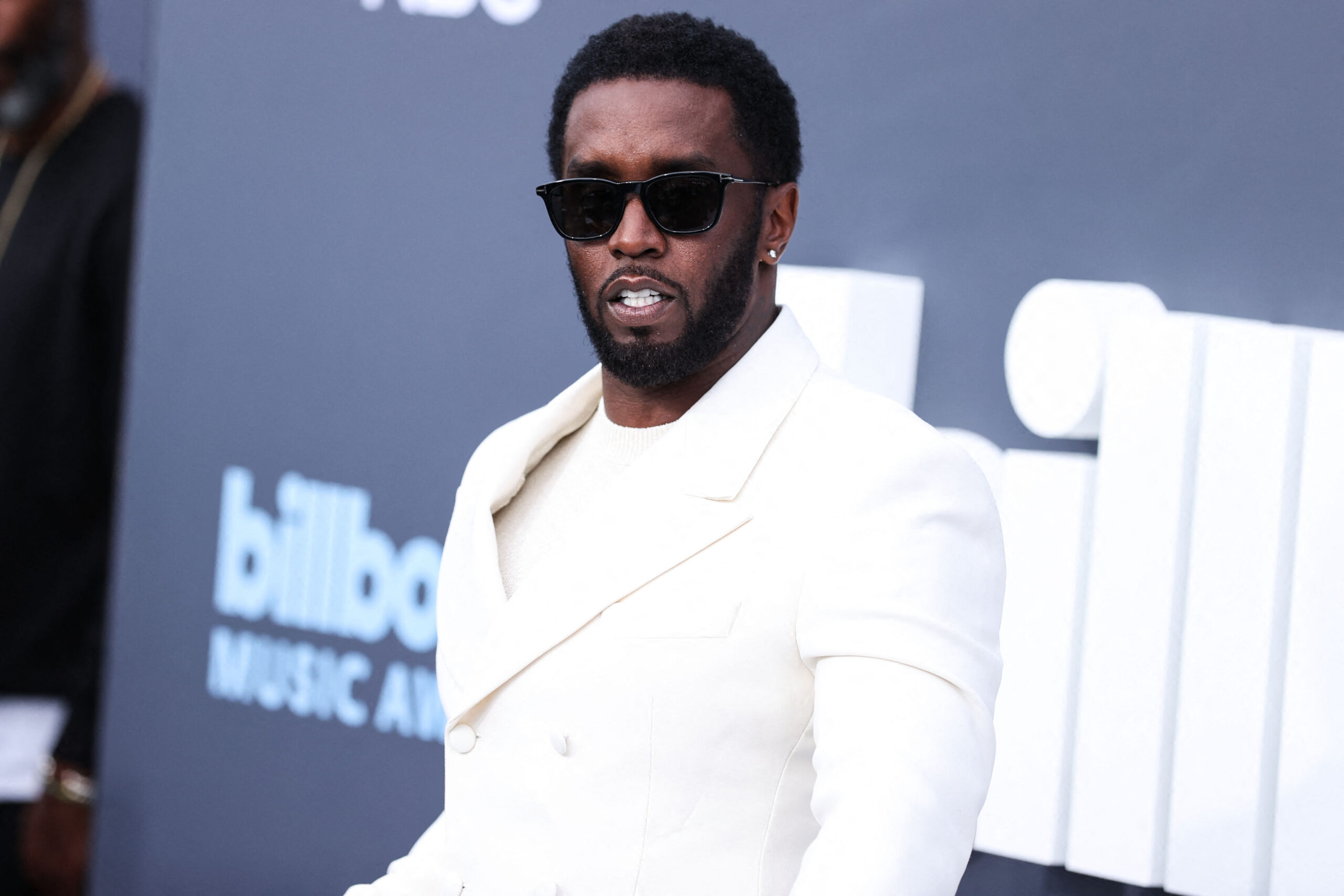Diddy in white suit