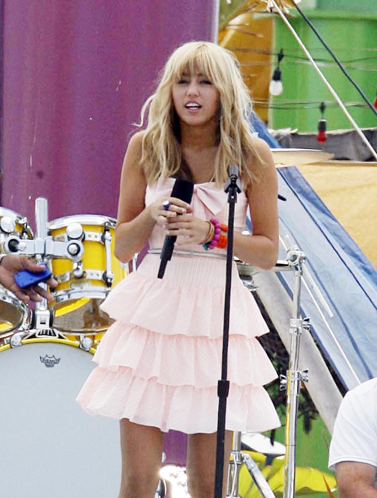 Miley Cyrus as Hannah Montana