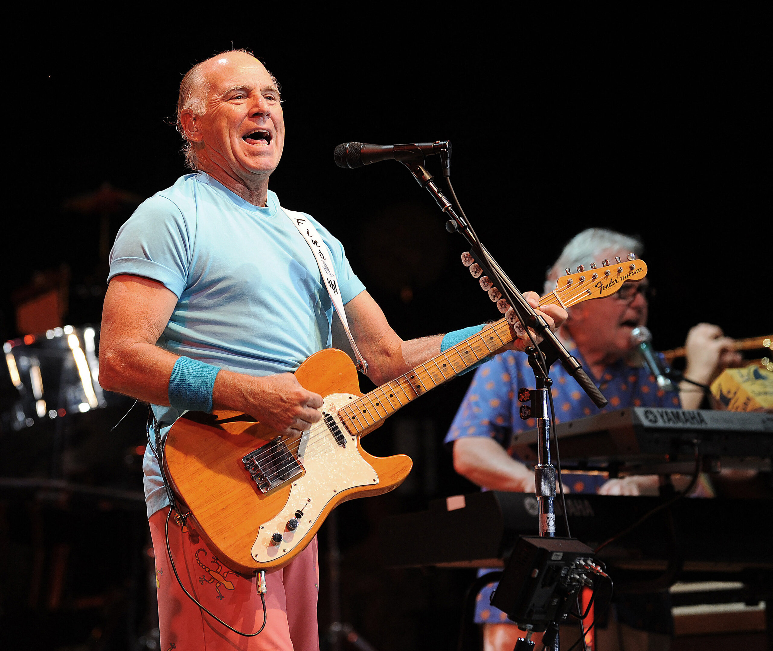 Jimmy Buffett playing guitar