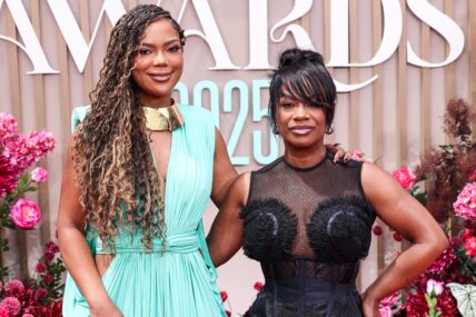 Riley and Kandi Burruss posing on the red carpet at the BET Awards.