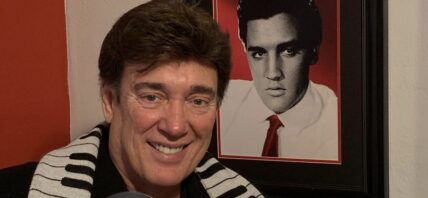Ronnie McDowell with Elvis poster