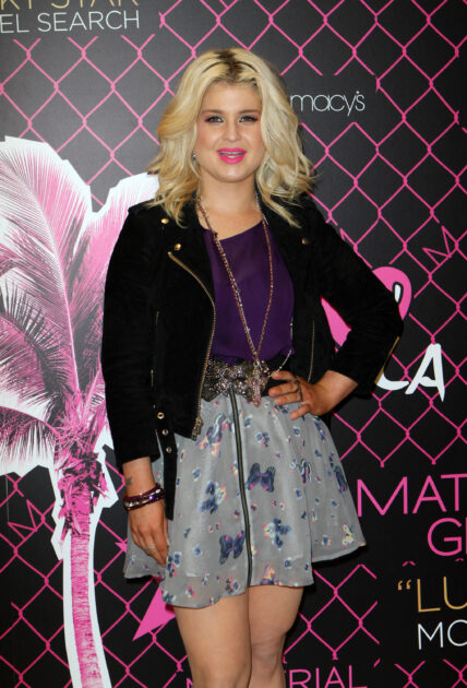 Kelly Osbourne wearing a short skirt appears as the Material Girl spokesperson at Macy's Dadeland