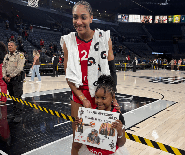 A'ja Wilson with young fan