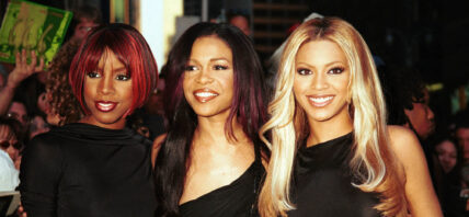 Destiny's Child posing together on the red carpet.