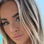Emily Elizabeth Impresses Poolside In Cut-Out Swimsuit