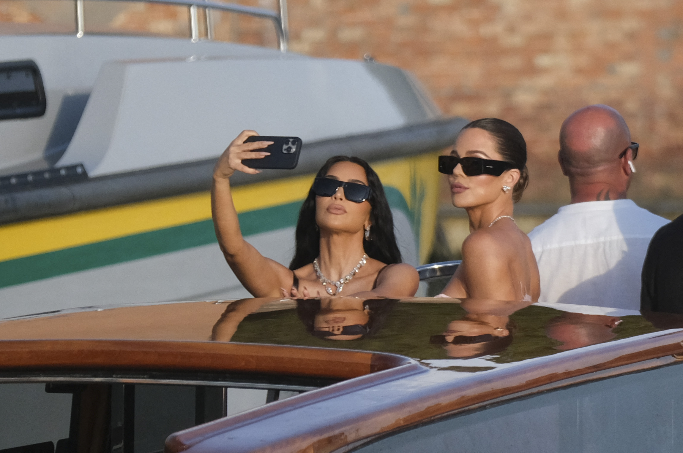 Kim and Khloè Kardashian heading to Bezos' wedding in Venice.