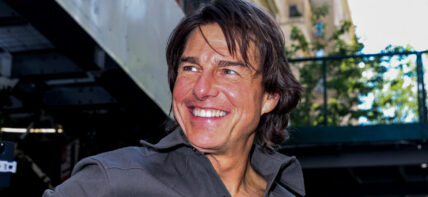 Tom Cruise is seen waving to his fans outside his car as he leaves his hotel this afternoon in New York City