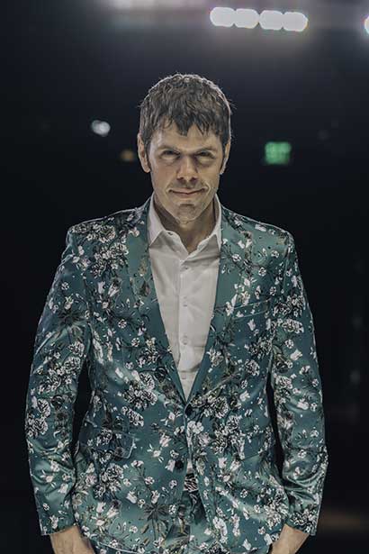 Perez Hilton in green suit