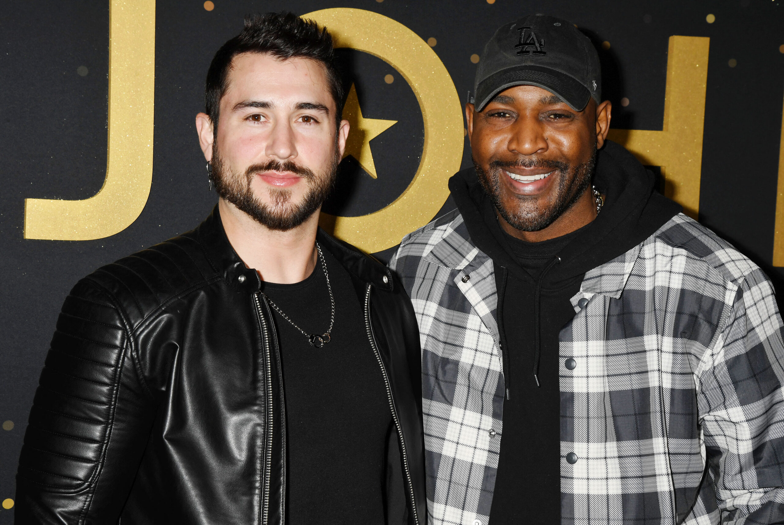Karamo Brown and Carlos Medel at Disney+ "Elton John Live: Farewell From Dodger Stadium" Yellow Brick Road Event - Arrivals