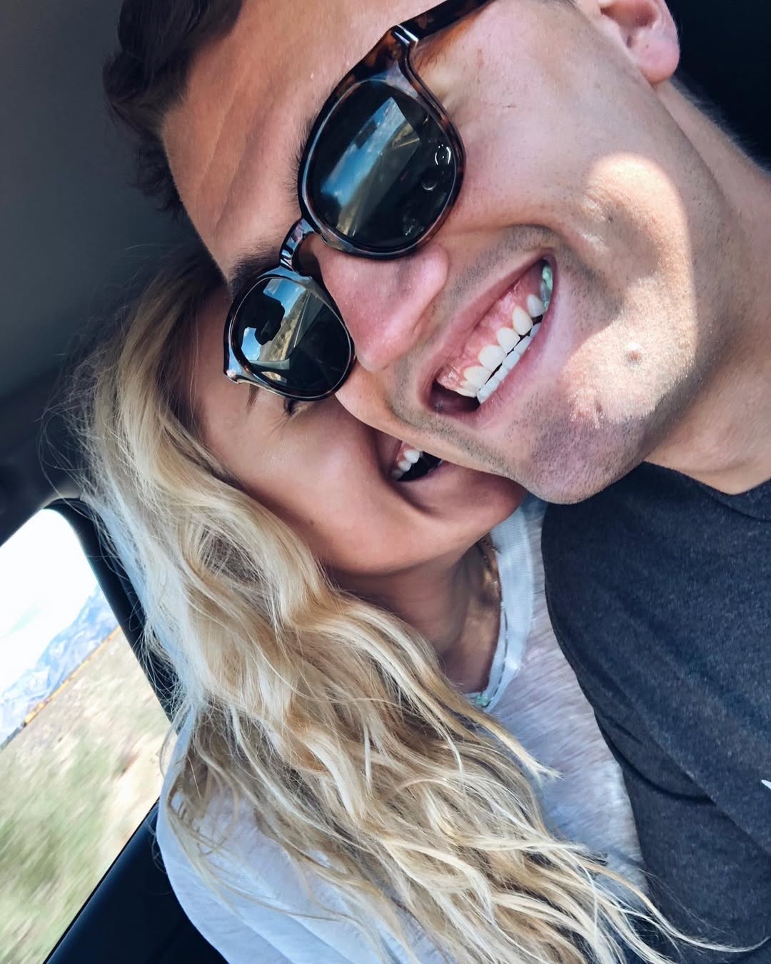 Charlie Kirk and Erika Kirk laughing