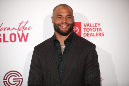 Dak Prescott posing on the red carpet.