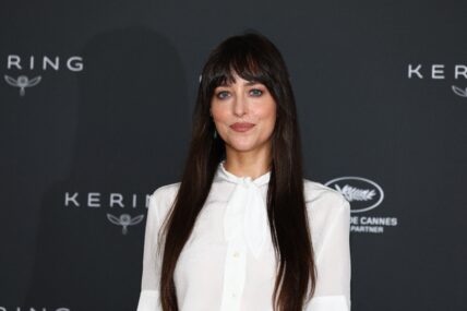 Dakota Johnson poses during Cannes 2025 photocall