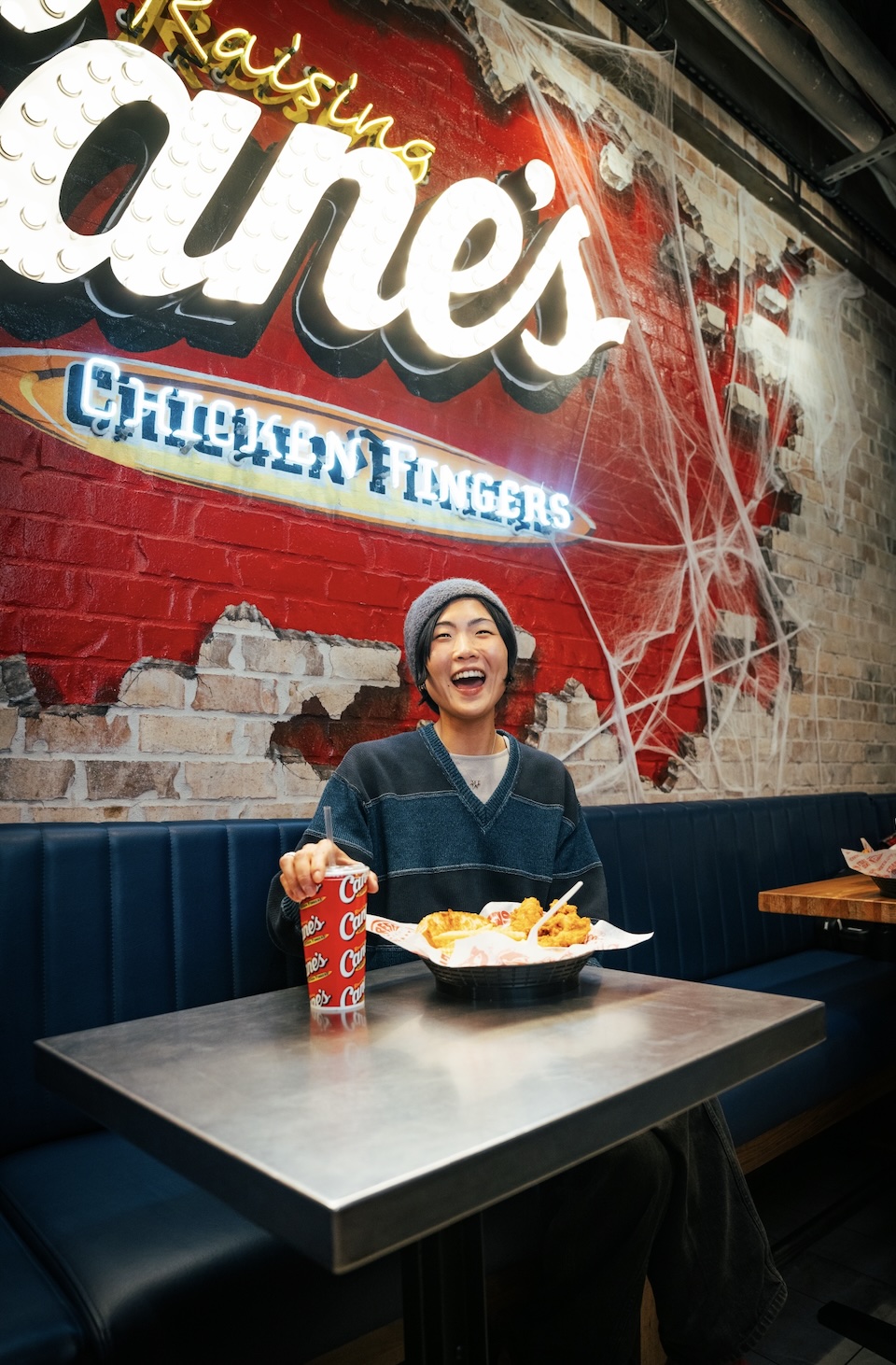 May Hong during a surprise “shift” at Raising Cane’s Times Square Global Flagship