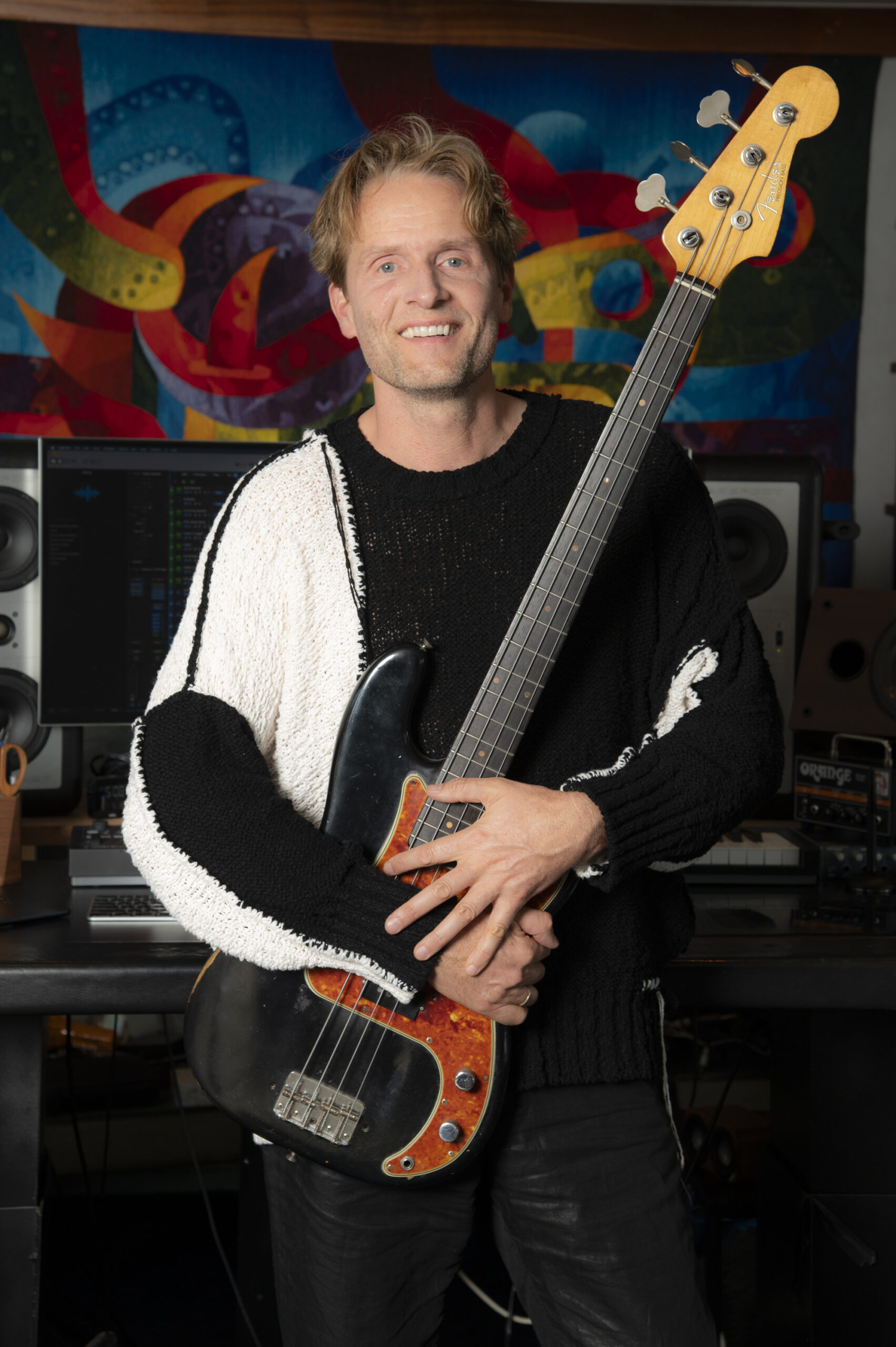 Toby Gad holding guitar