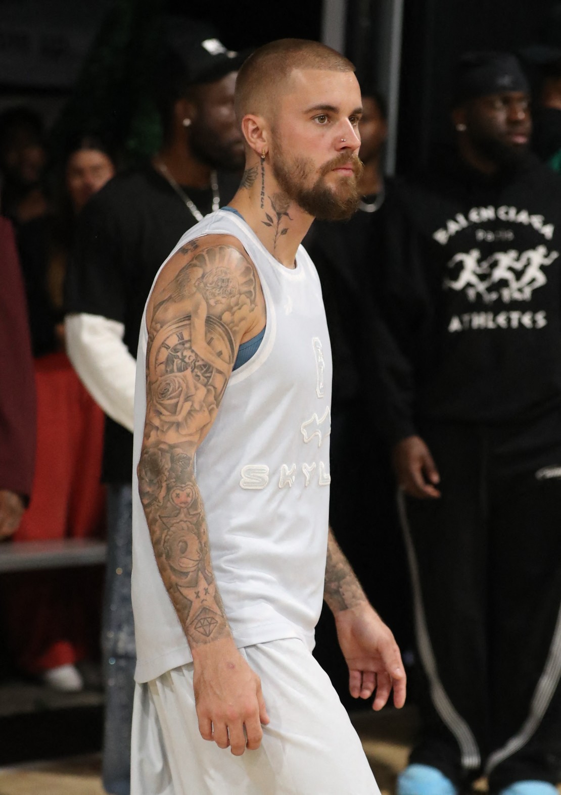 Justin Bieber seen playing for his team and representing his clothing company SKLRK at basket ball game