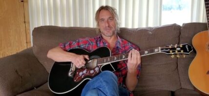 Todd Snider playing guitar
