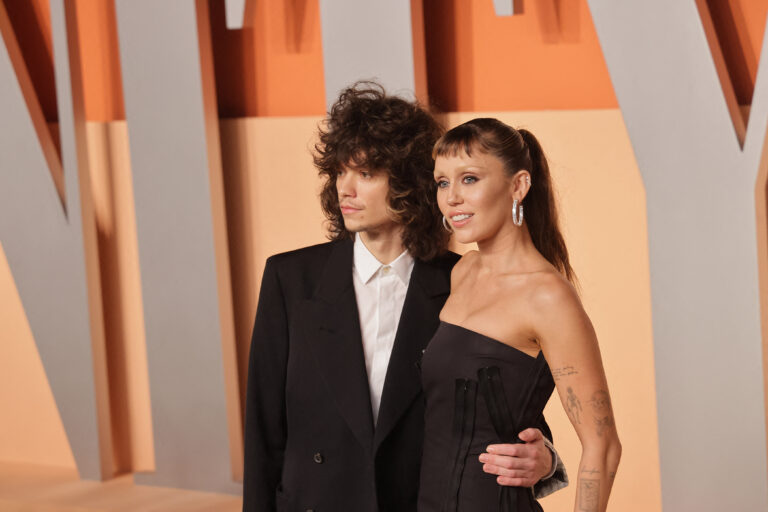 Miley Cyrus and Maxx Morando at the 2025 Vanity Fair Oscar Party