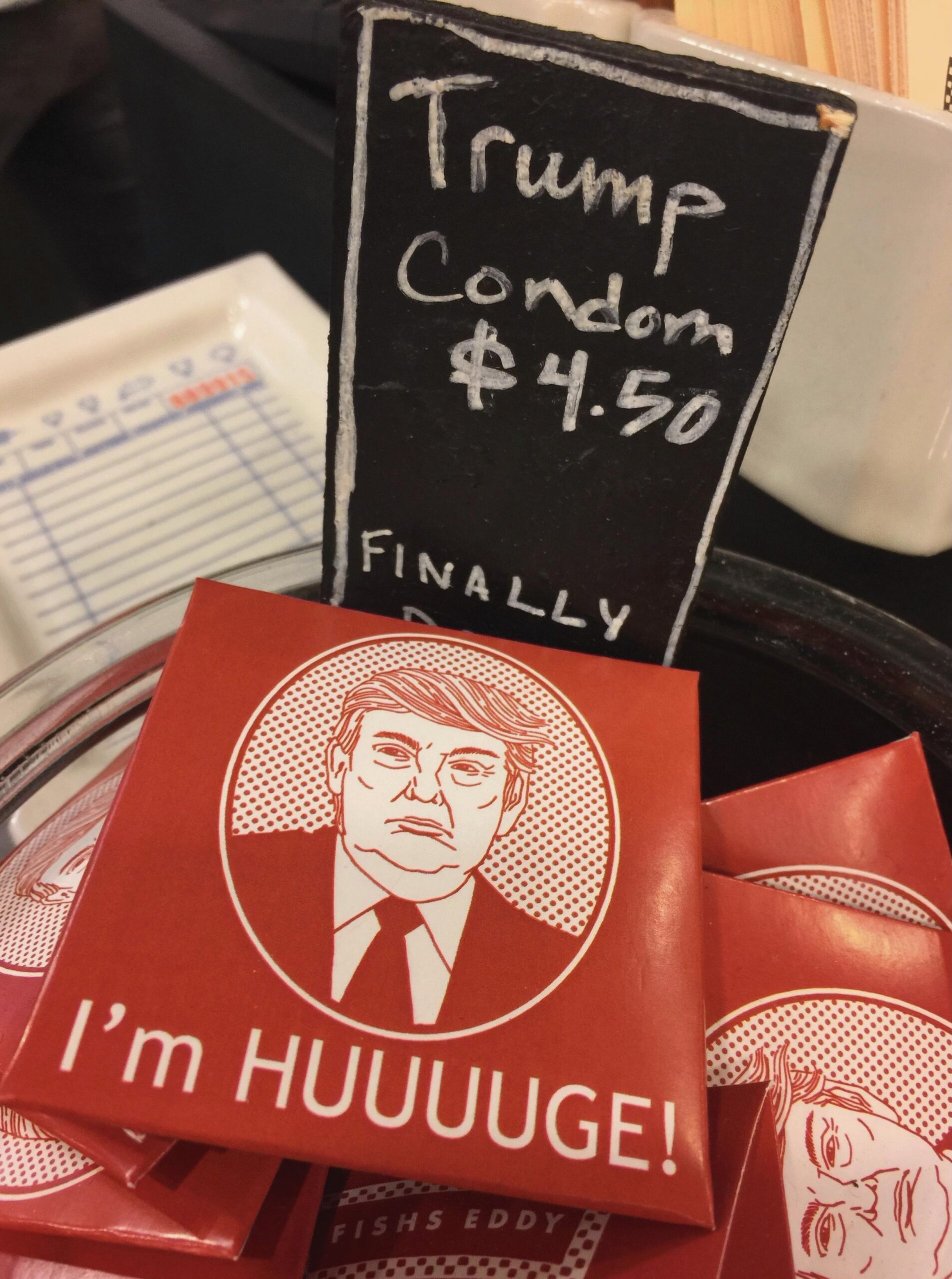 Phoro showing Donald Trump's face on a condom packet