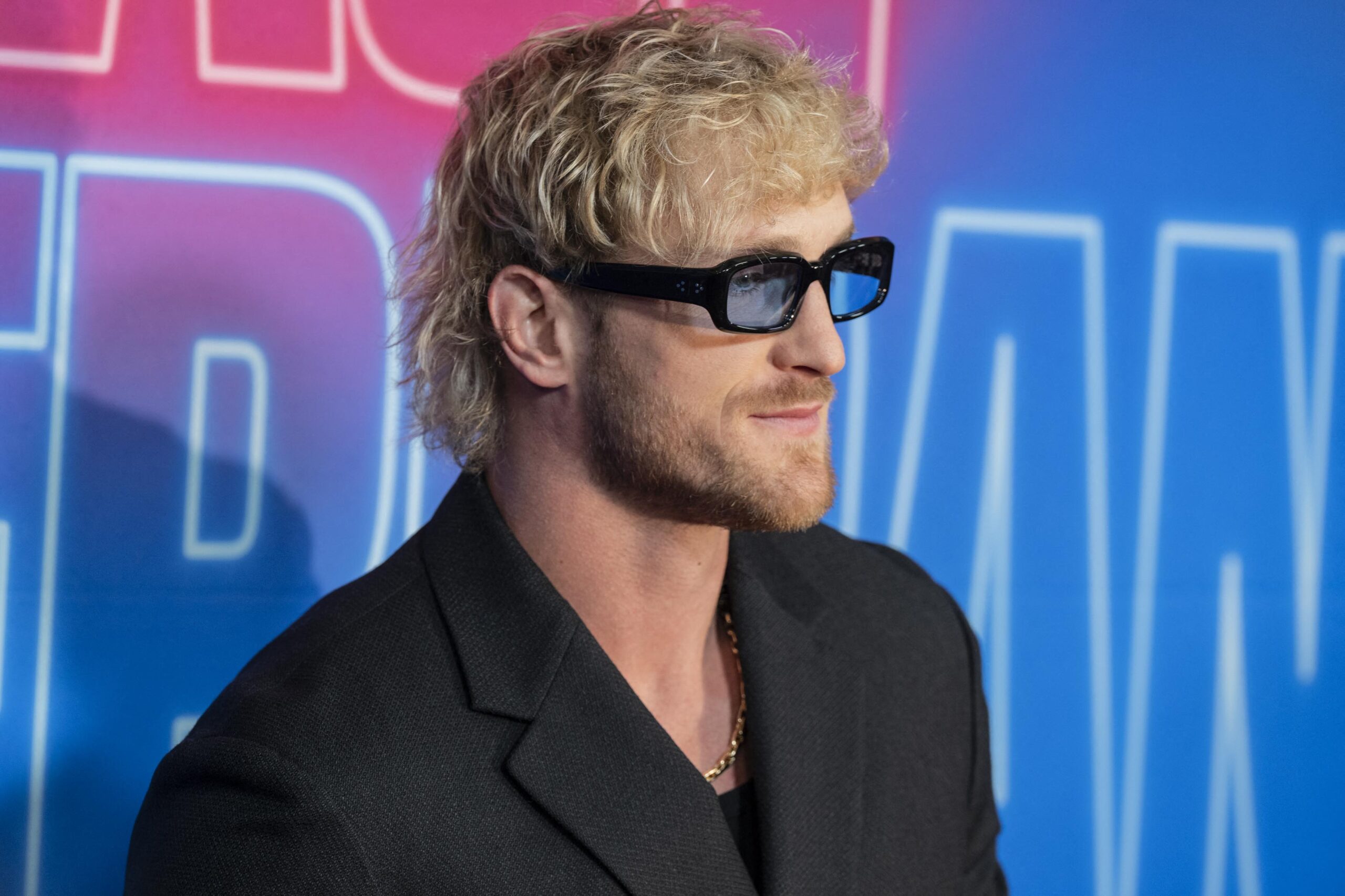 Logan Paul posing on the red carpet. 