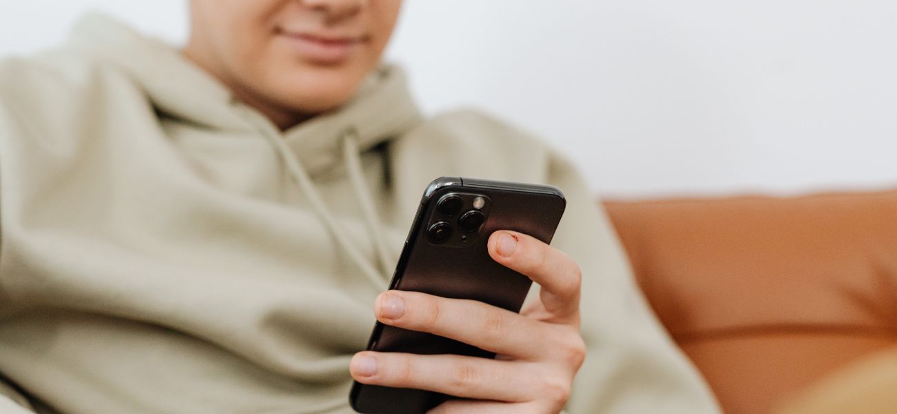 Man typing on phone