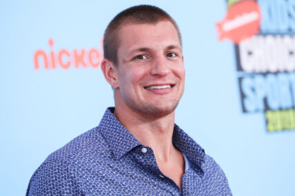 Rob Gronkowski posing on the red carpet.