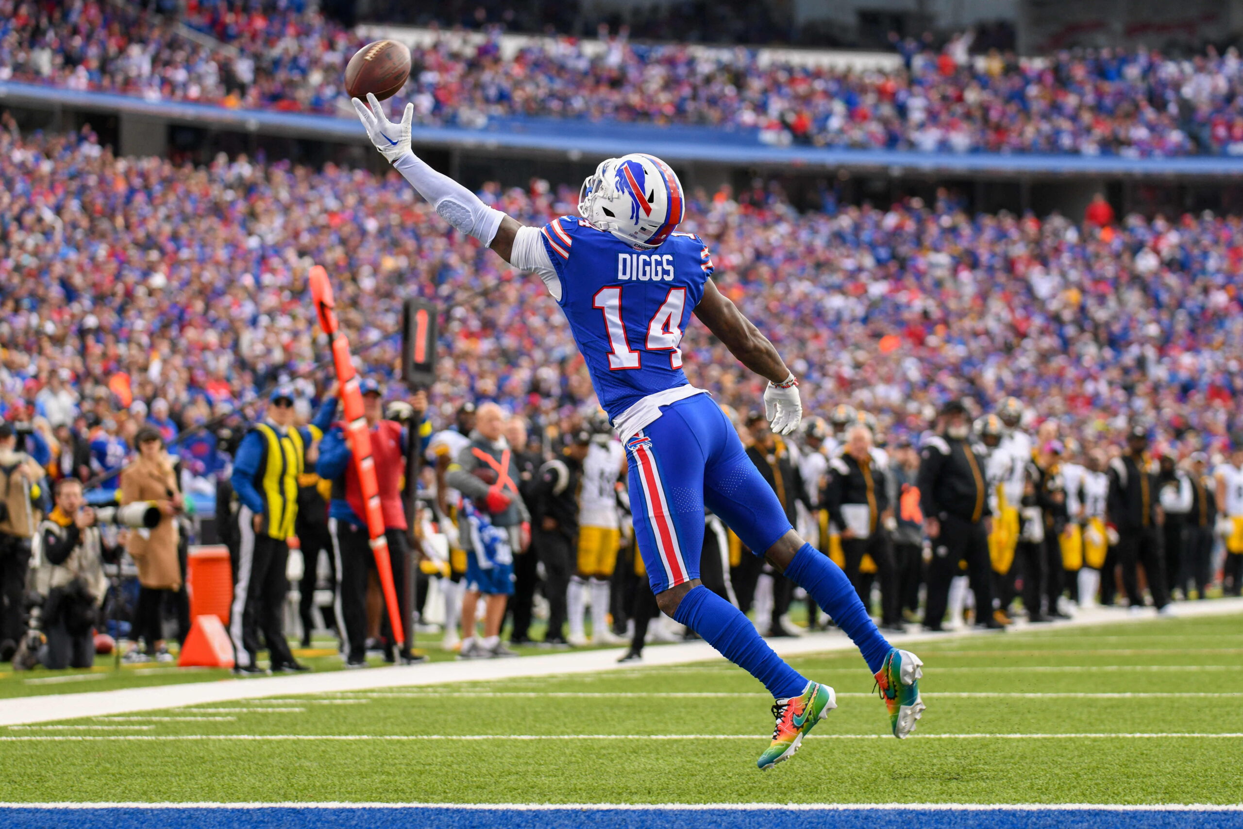 Stefon Diggs catching a football