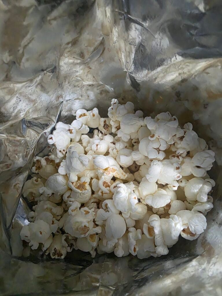 Khloé Kardashian Enters The Snack Game With Khloud Protein Popcorn