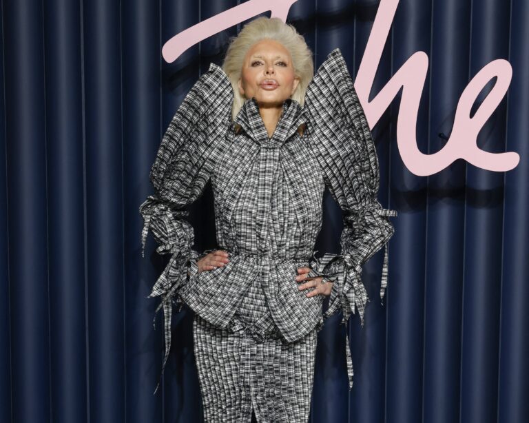 Rinna wearing a grey dress