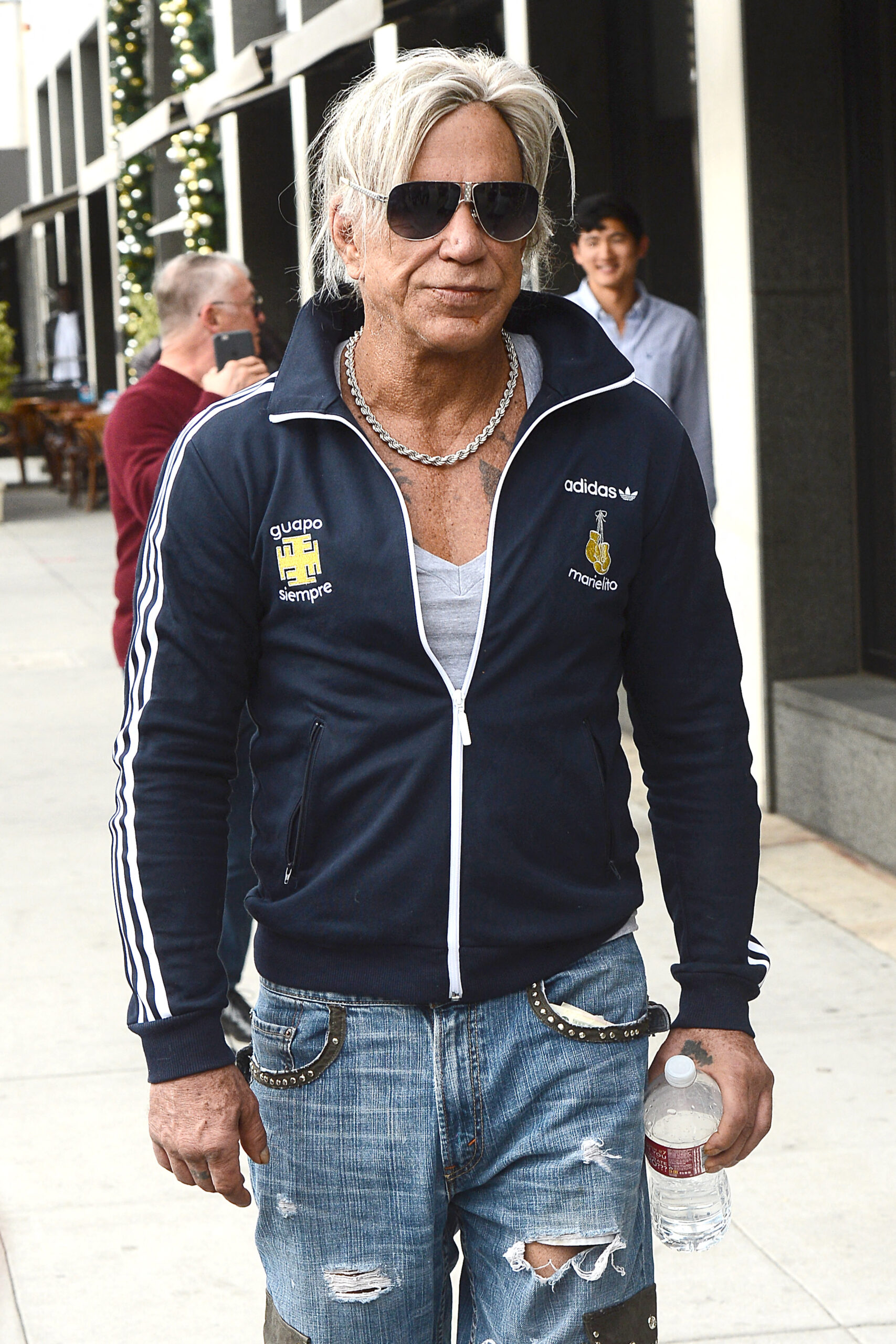 Mickey Rourke walking in Beverly Hills.