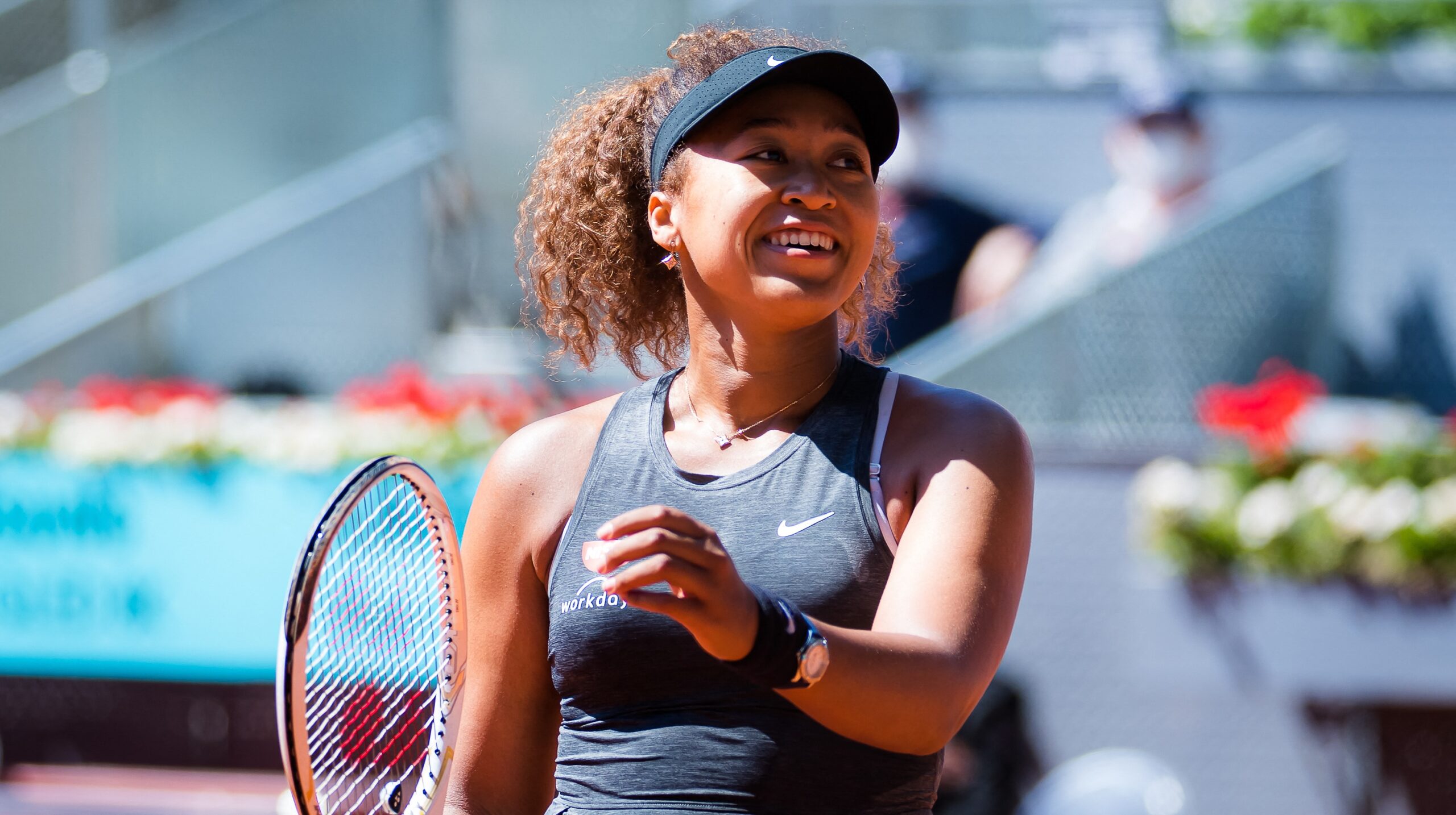 Naomi Osaka playing tennis