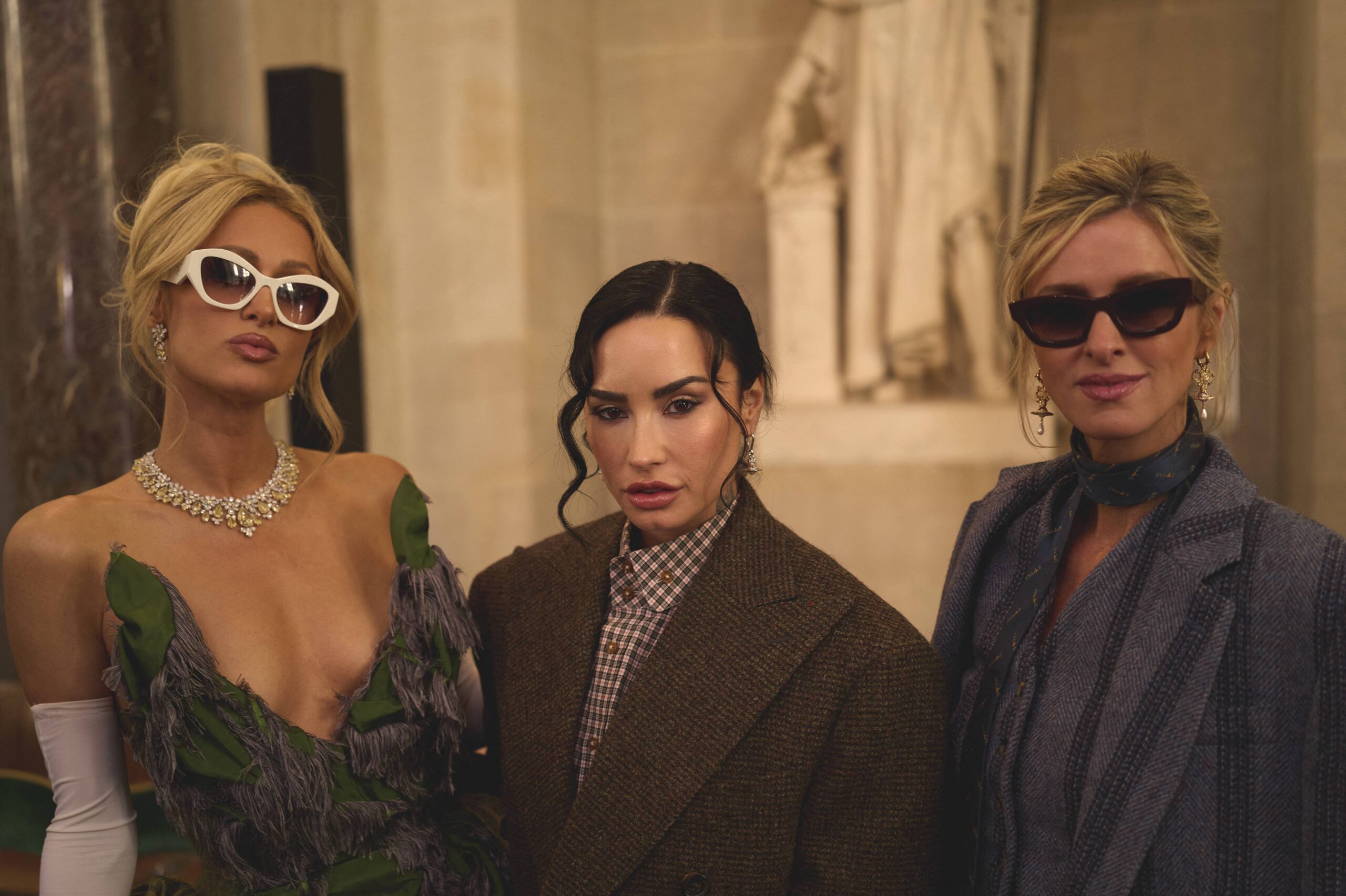 Paris Hilton and Demi Lovato at Paris Fashion Week - Vivienne Westwood Fashion Show