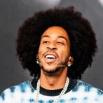 Ludacris performing on stage.