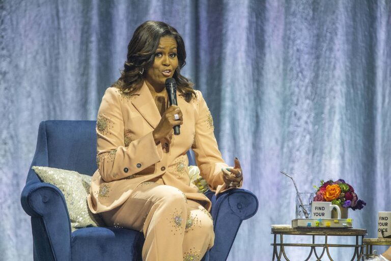 Michelle Obama speaking at an event.