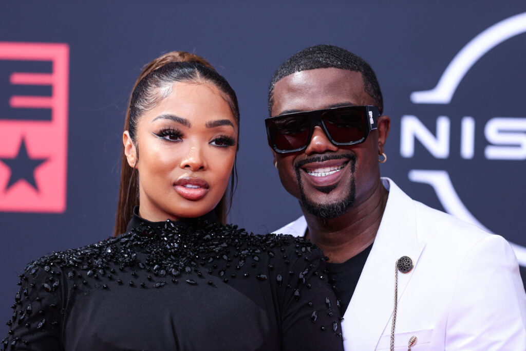 Ray J and Princess Love posing