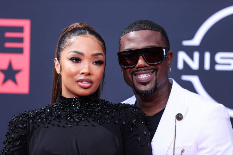 Ray J and Princess Love posing