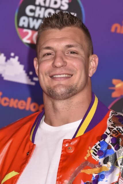 Rob Gronkowski posing on the red carpet.