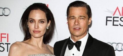Angelina Jolie (wearing an Atelier Versace gown and Procop jewels) and Brad Pitt (wearing Lanvin) arrive at the opening night gala premiere of Universal Pictures' 'By the Sea' during AFI FEST 2015 presented by Audi held at the TCL Chinese Theatre IMAX on November 5, 2015 in Hollywood, Los Angeles, California, United States. 05 Nov 2015