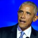 Barack Obama speaking on stage