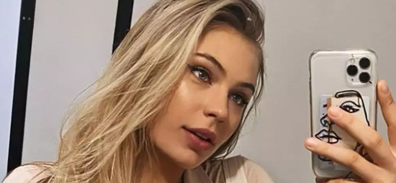 Jutta Leerdam on the beach celebrating after winning Olympic gold