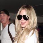 Kim Zolciak and Kroy Biermann walking