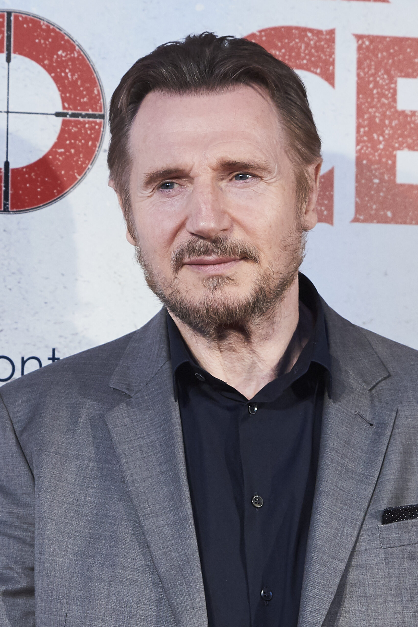 Liam Neeson on a red carpet