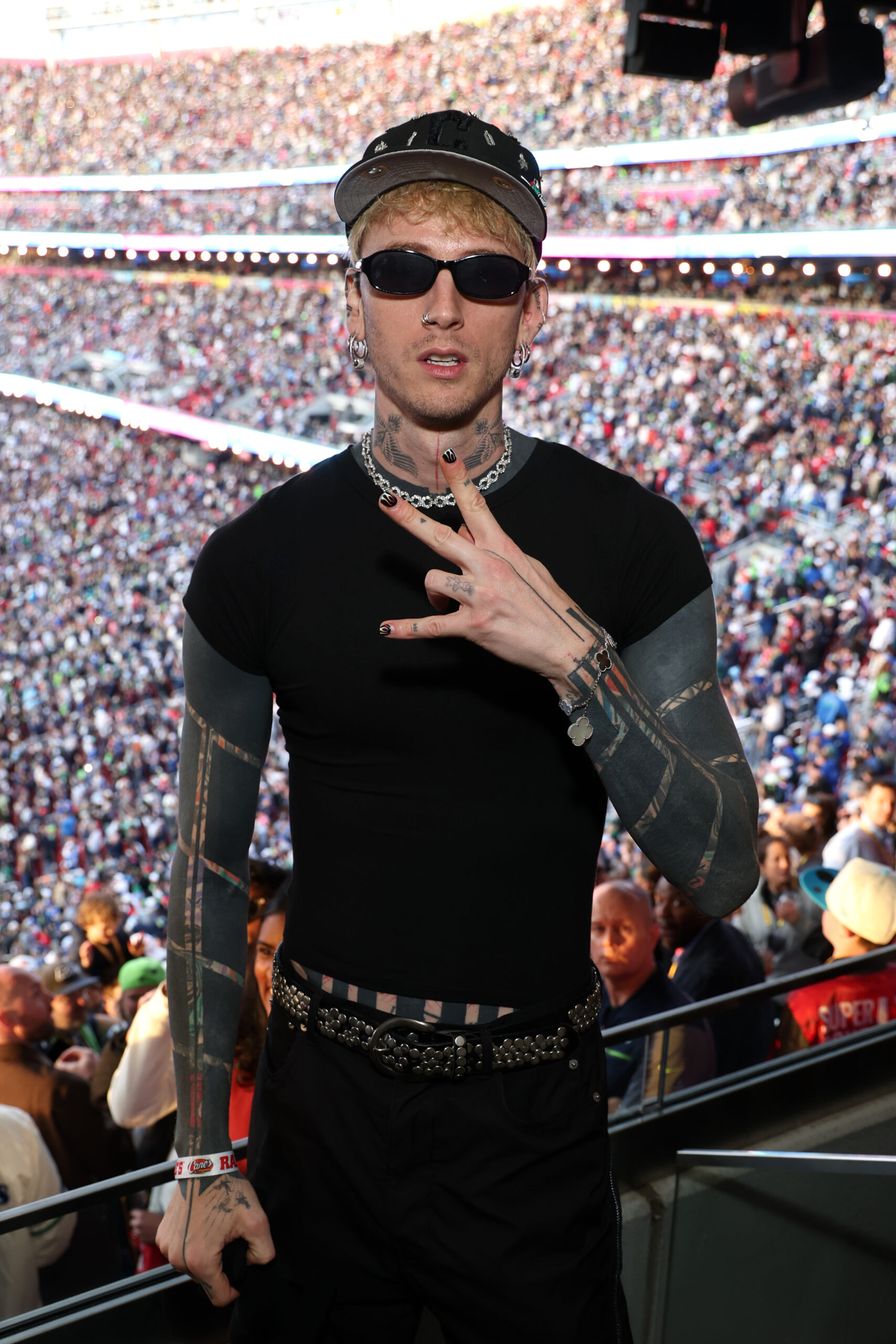 MGK inside Raising Cane's suite at Super Bowl