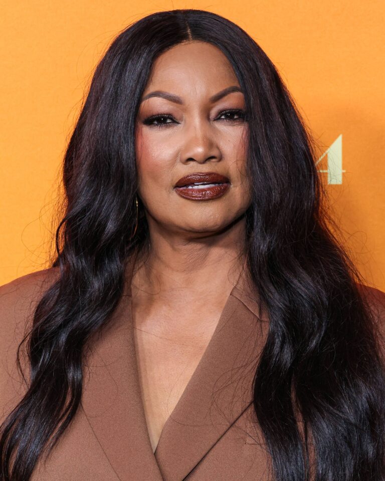Garcelle Beauvais posing on the red carpet. 