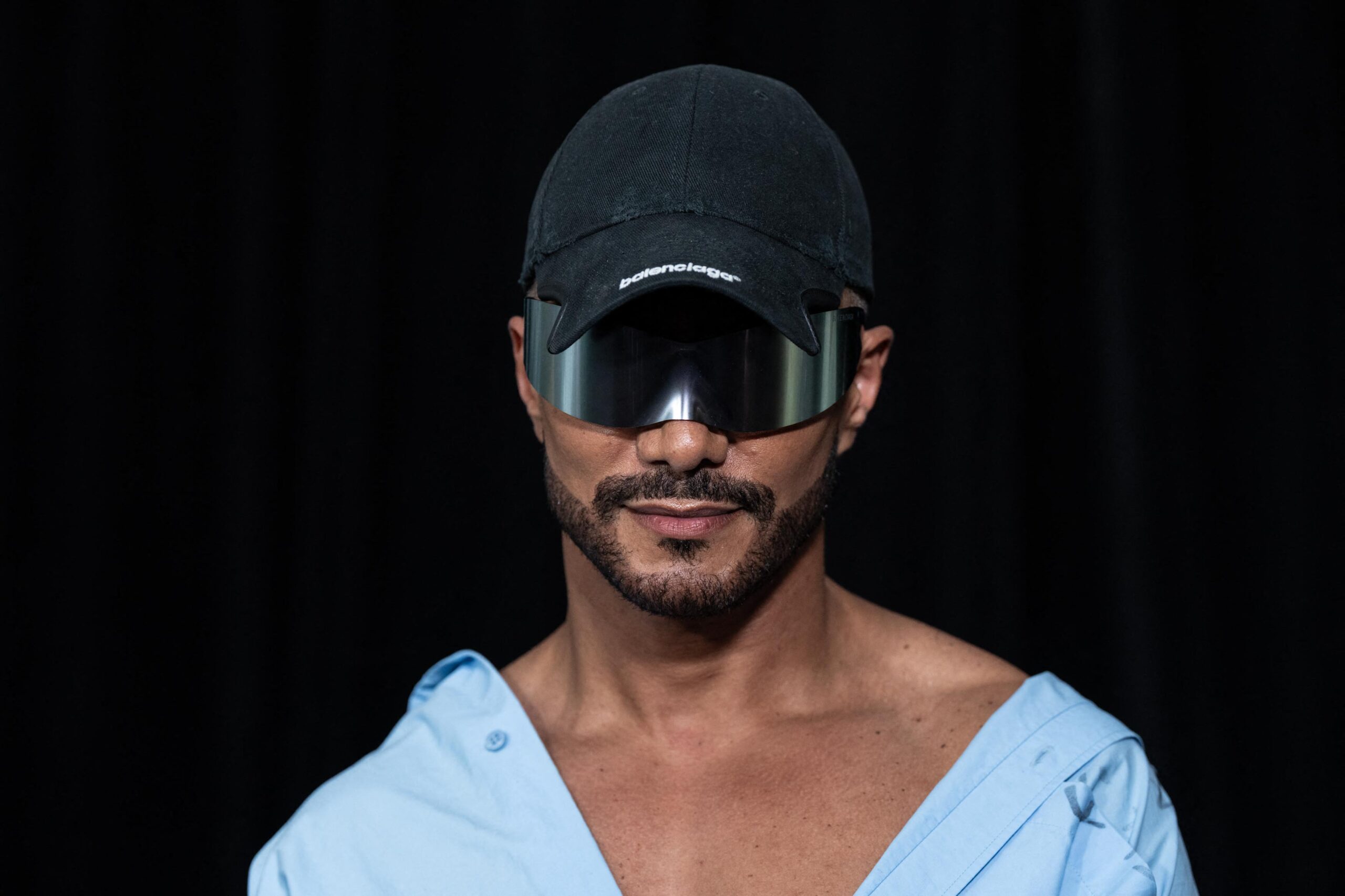 Jay Manuel posing on the red carpet. 