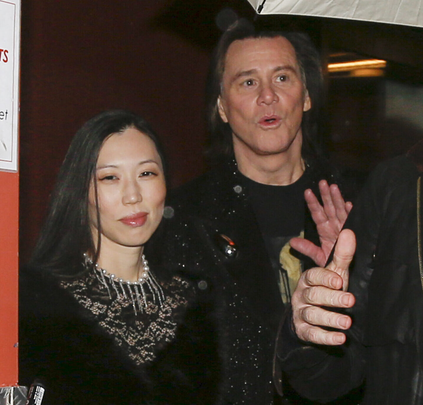 Jim Carrey is seen with his girlfriend Min Ah and his daughter leaving their hotel in Paris