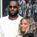 LeBron and Savannah James posing on the red carpet.