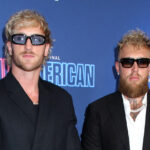 Logan and Jake Paul posing for photos
