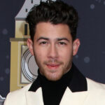 Nick Jonas attending premiere