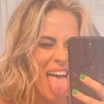 Paige VanZant sticking her tongue out in mirror