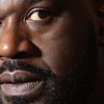 Shaquille O'Neal posing on the red carpet.